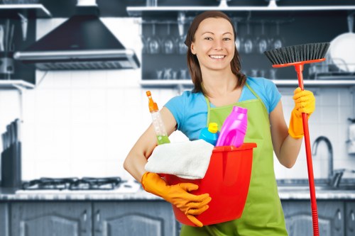 Cleaner preparing a short-term rental kitchen