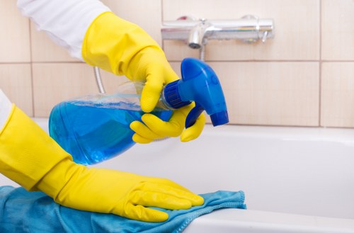 Tenant completing move out cleaning in a hallway