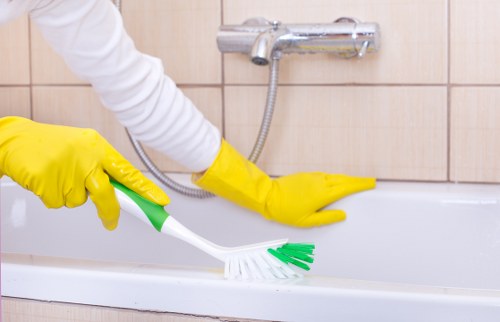 Technician performing sofa cleaning in Missing Location
