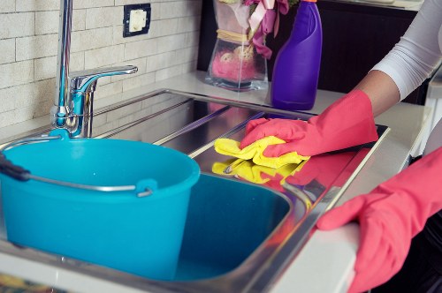 Step-by-step mattress cleaning process on a bed surface